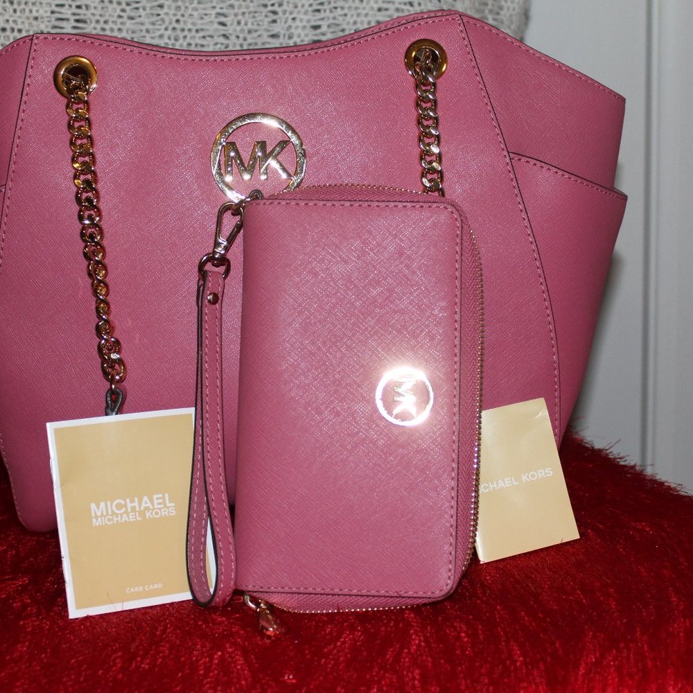 Michael Kors Pink purse and matching wristlet wallet.
